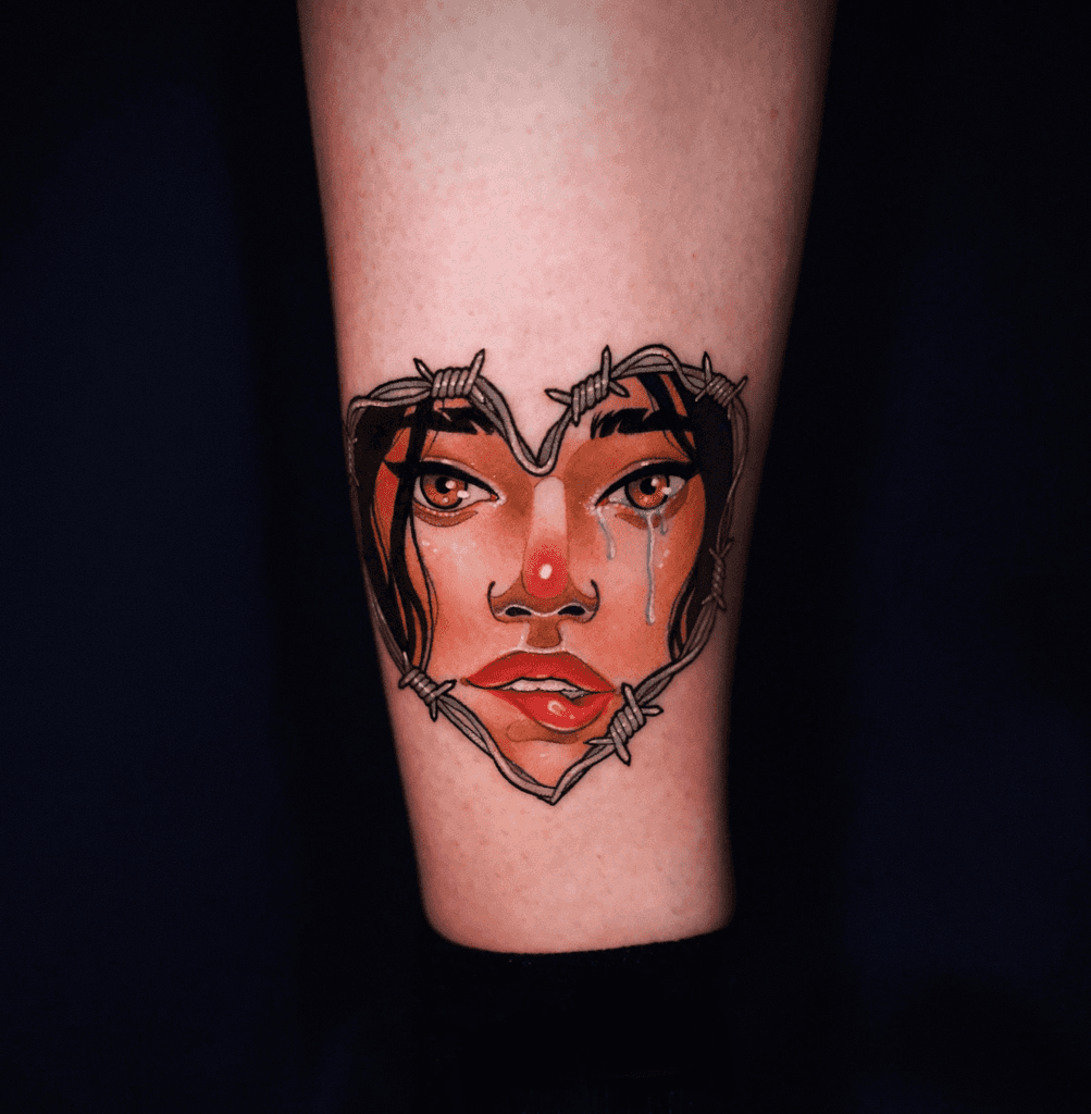 Kolorowy, neotradycyjny tatuaż portret na nodze, wykonany przez Dorotę z Ashi Tattoo